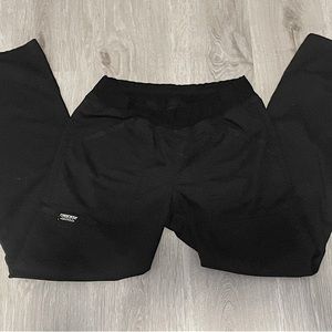 Black, scrub-like pants, baggy